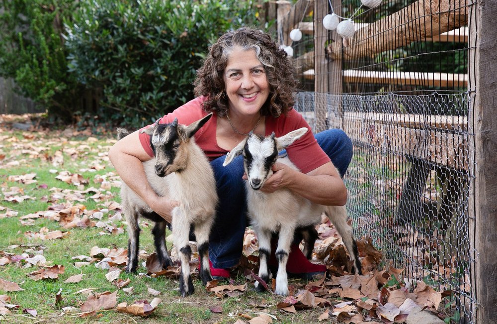 Jeannine Alvaré with two goats